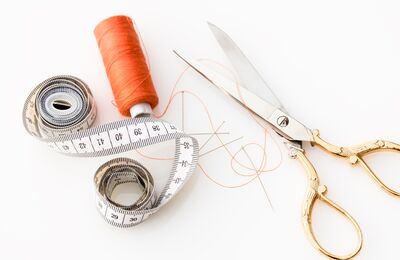 Scissors, measuring tape, thread