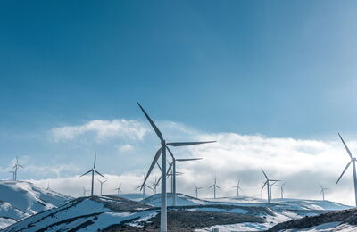 Wind farm in winter landscape